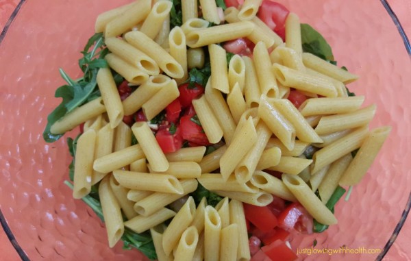 Gluten-free arugula basil tomato pasta salad